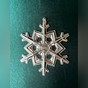 Gorham Sterling Christmas snowflake with gold filled year mark.